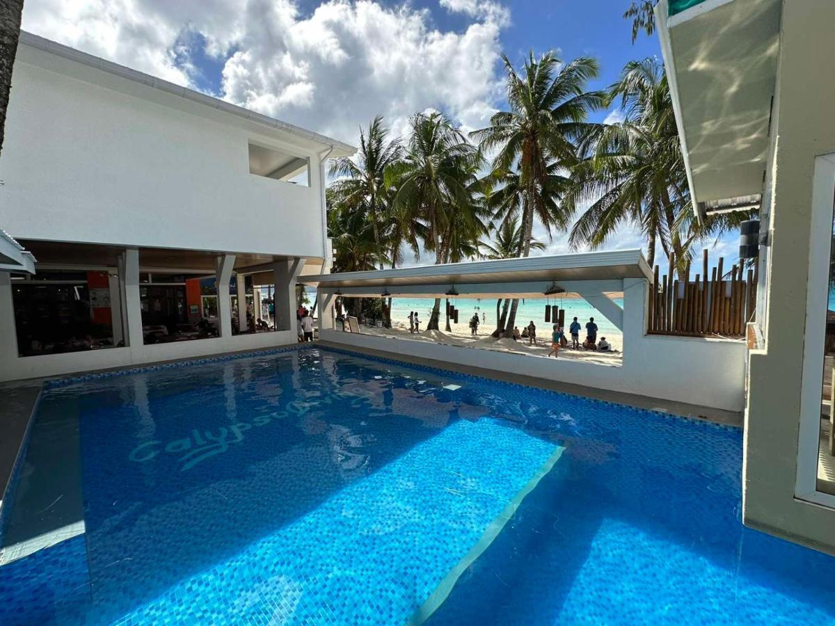 Calypso Beach And Dive Resort Manoc-Manoc Exteriör bild