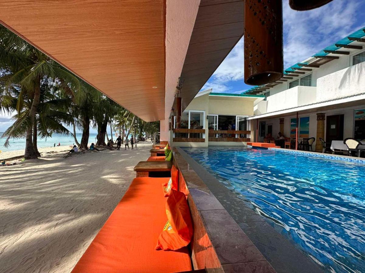 Calypso Beach And Dive Resort Manoc-Manoc Exteriör bild