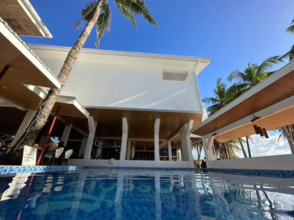 Calypso Beach And Dive Resort Manoc-Manoc Exteriör bild