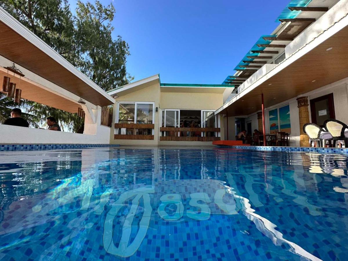 Calypso Beach And Dive Resort Manoc-Manoc Exteriör bild