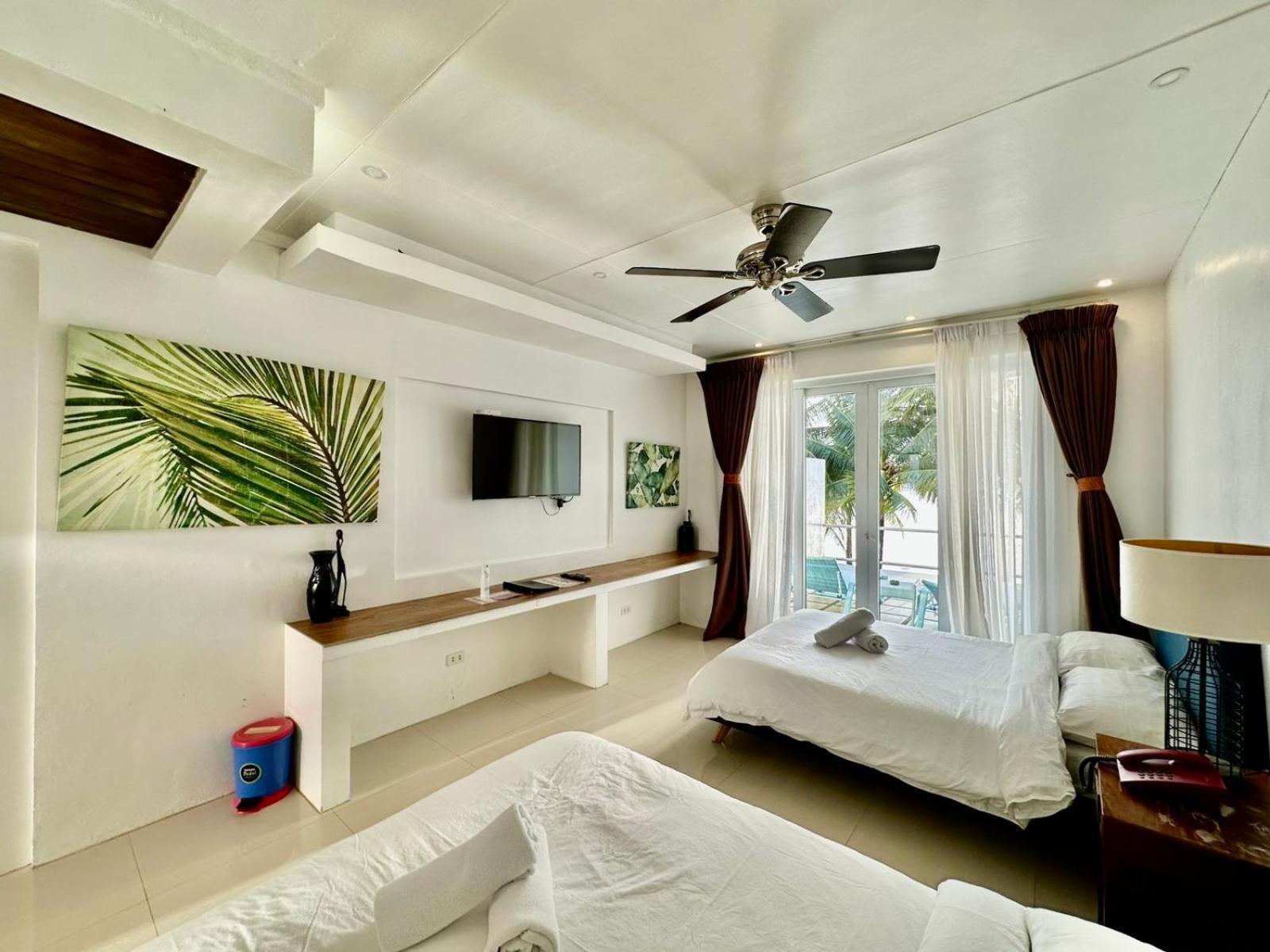 Calypso Beach And Dive Resort Manoc-Manoc Exteriör bild