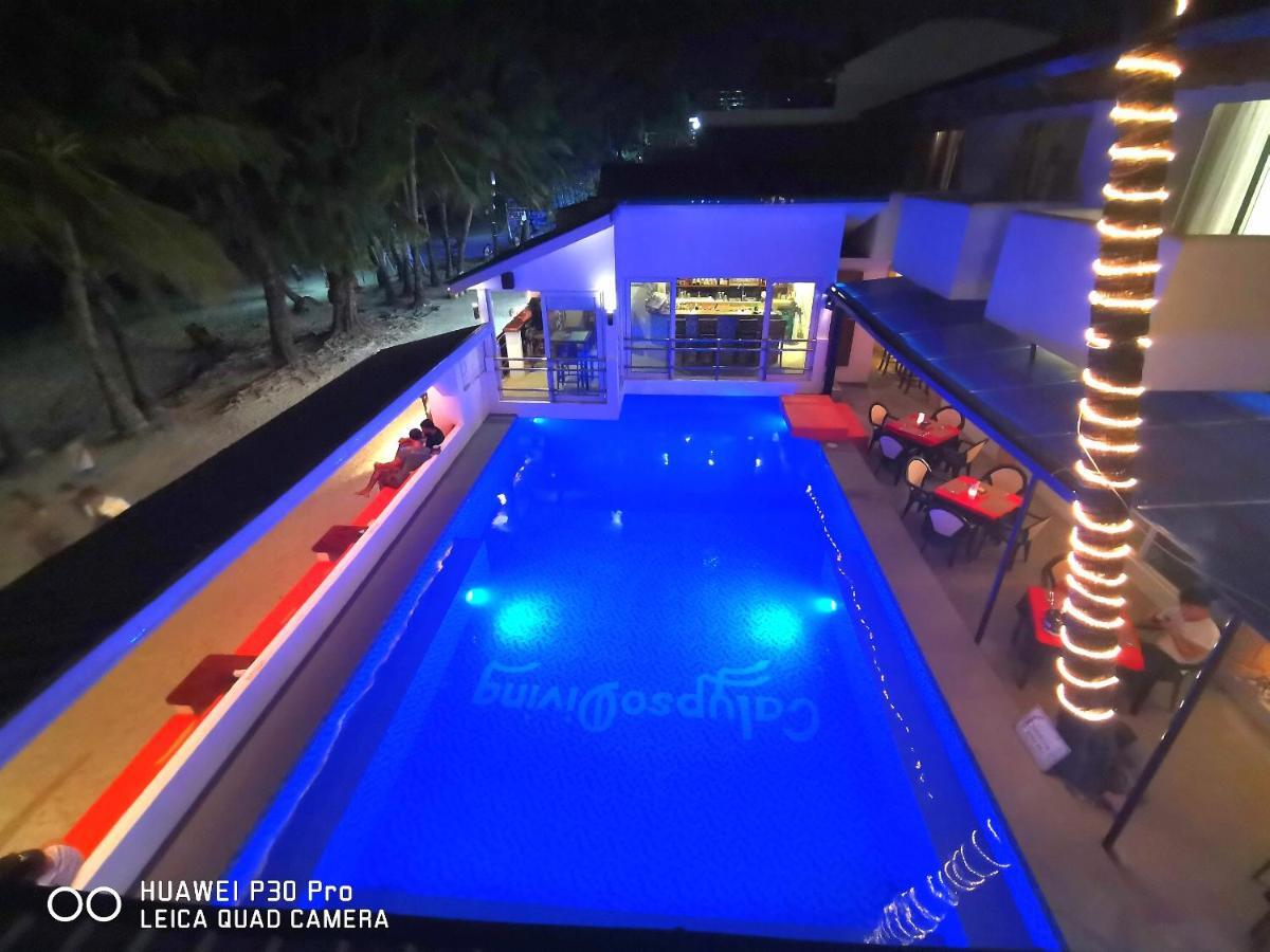 Calypso Beach And Dive Resort Manoc-Manoc Exteriör bild