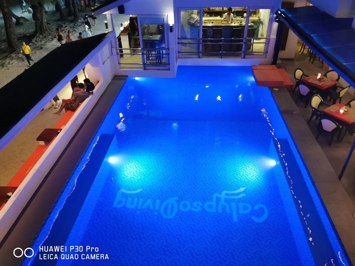 Calypso Beach And Dive Resort Manoc-Manoc Exteriör bild